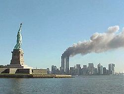 20101206140357-250px-national-park-service-9-11-statue-of-liberty-and-wtc-fire.jpg